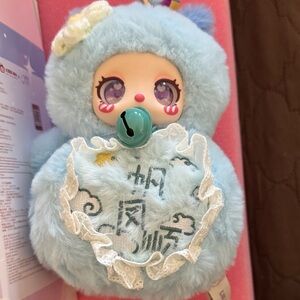 Blue Plush Doll with Bell